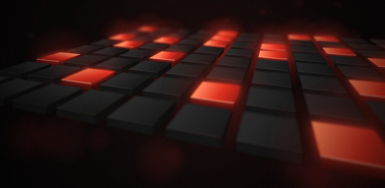 Close-up of a step sequencer pad grid with lit steps